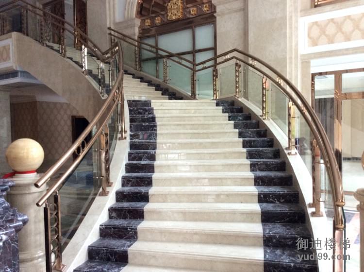 酒店大理石玻璃護欄弧形樓梯案例